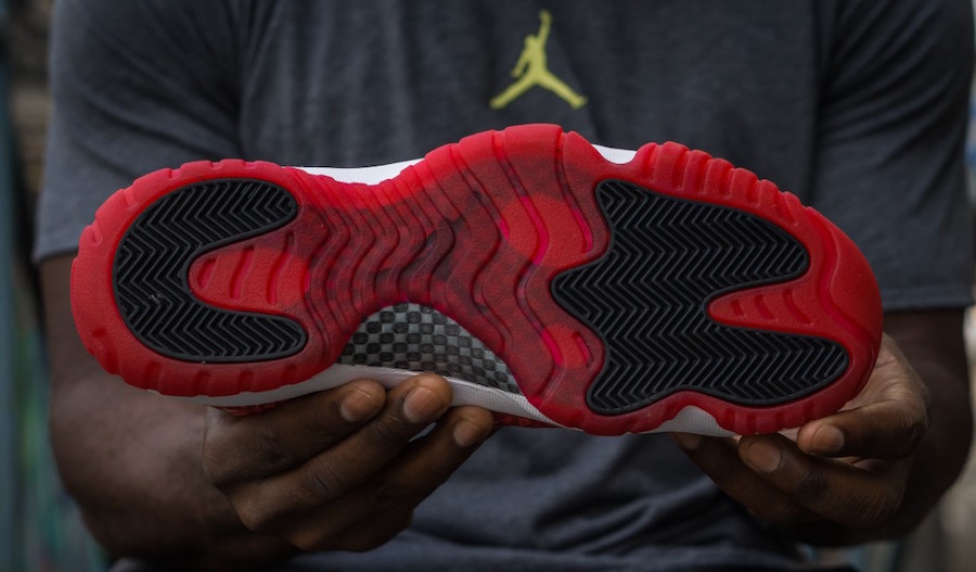 jordan-11-low-ie-gym-red-on-feet-7